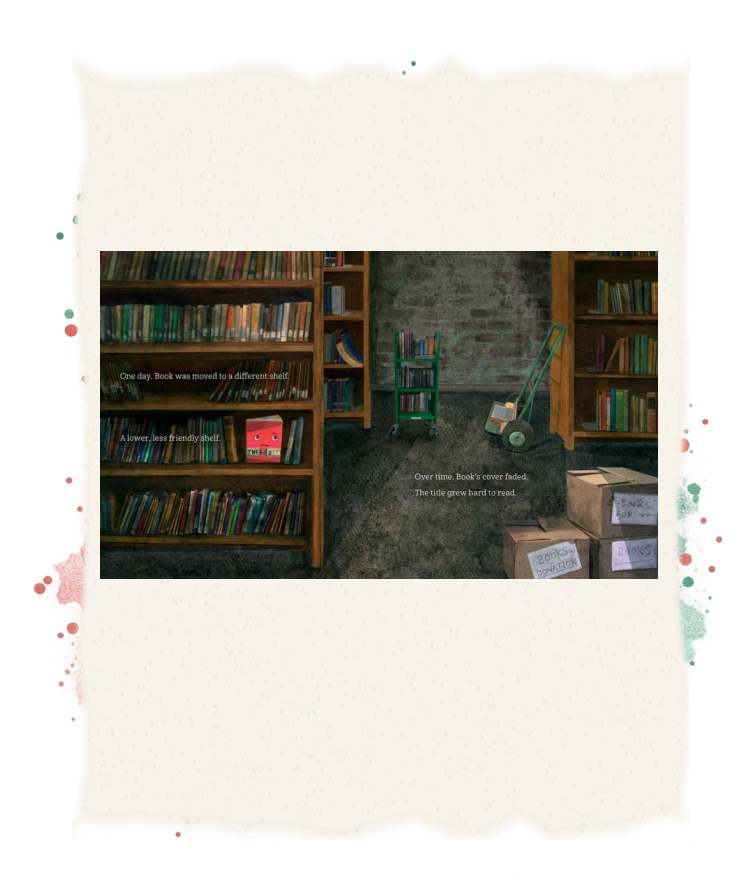 Book sits on a low library shelf near a cart, hand truck and donation boxes.